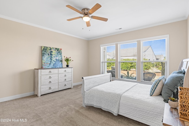 bedroom featuring baseboards and crown molding