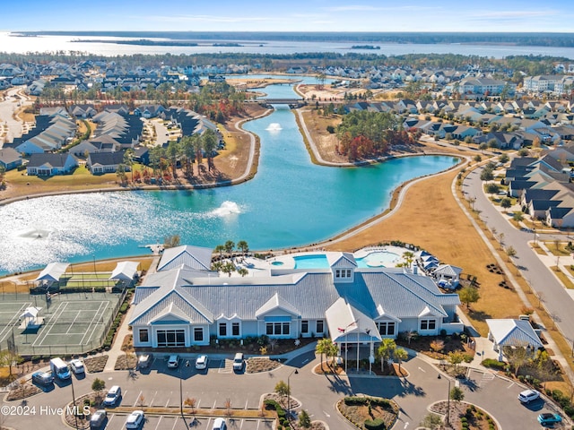 birds eye view of property featuring a residential view and a water view