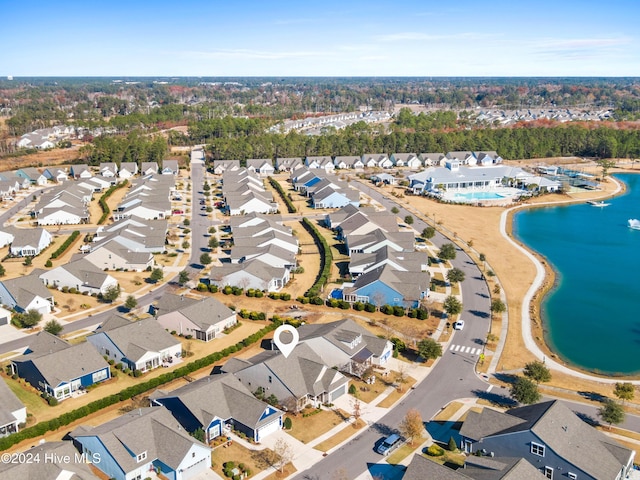 bird's eye view with a residential view and a water view