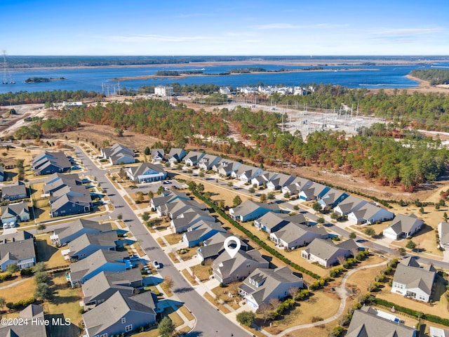 aerial view featuring a residential view and a water view