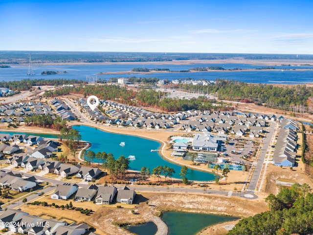 aerial view with a water view and a residential view