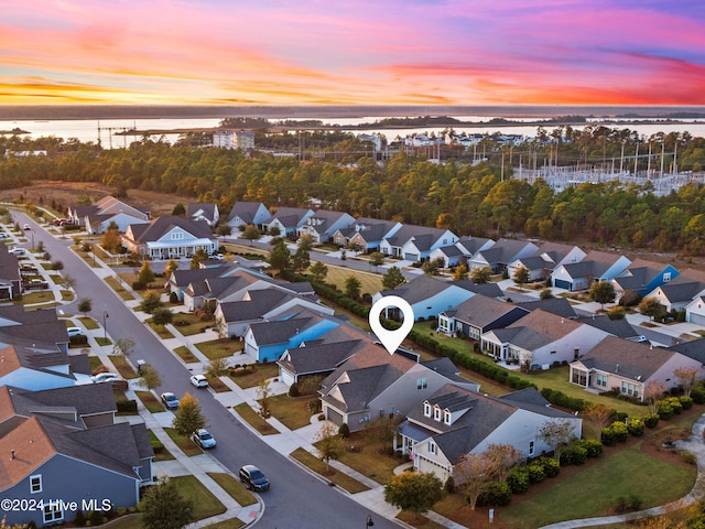 aerial view featuring a water view and a residential view