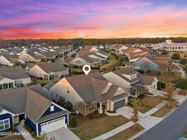 4104 Passerine Ave, Wilmington, NC 28412 - aerial view at dusk with a residential view