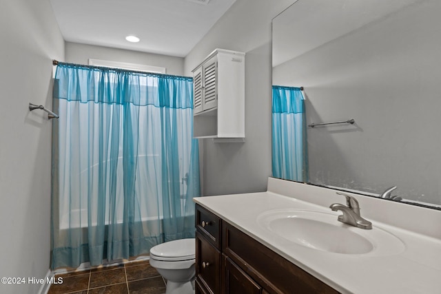 full bathroom with tile patterned flooring, vanity, shower / tub combo, and toilet