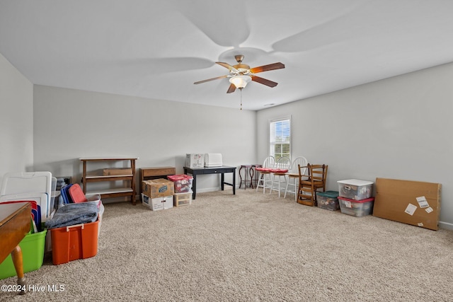 recreation room featuring carpet flooring and ceiling fan