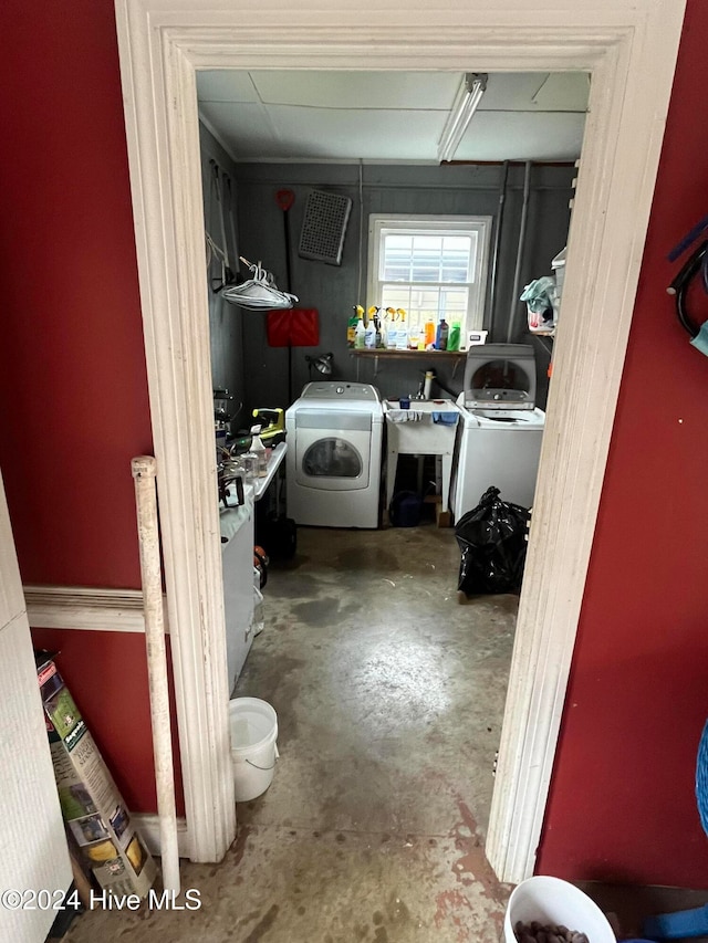 laundry area with washing machine and dryer