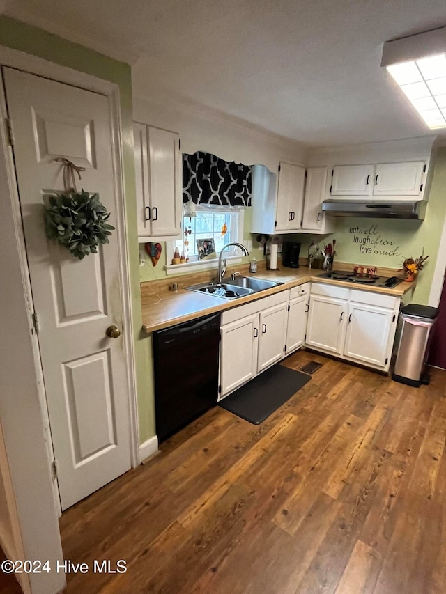 kitchen with dishwasher, white gas stovetop, white cabinets, sink, and hardwood / wood-style flooring