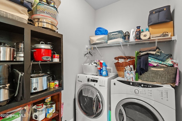 washroom featuring washing machine and dryer