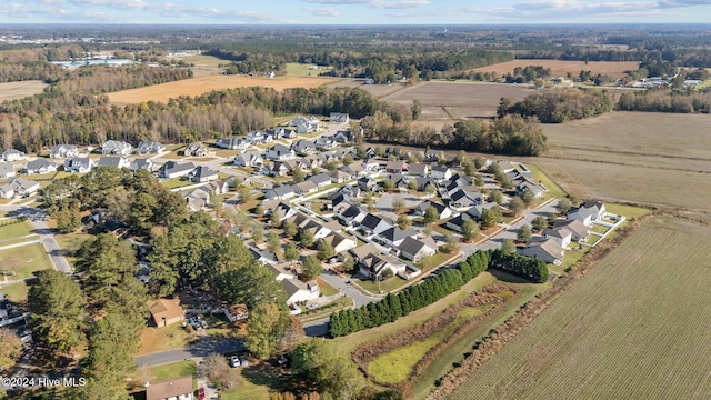 birds eye view of property featuring a rural view