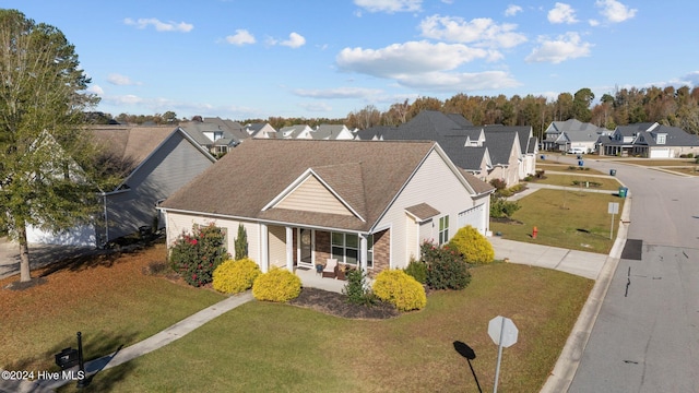 view of front of home featuring a front yard