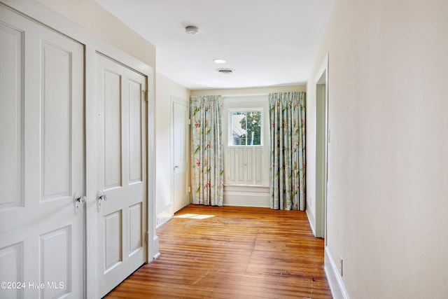 hall featuring light hardwood / wood-style flooring