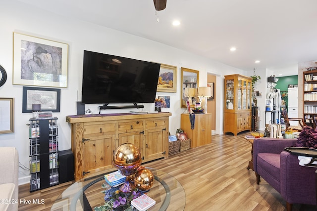 living room featuring recessed lighting and light wood-type flooring