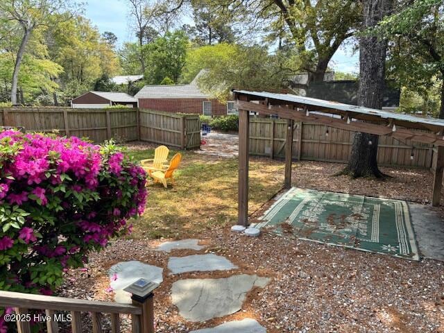 view of yard featuring a fenced backyard
