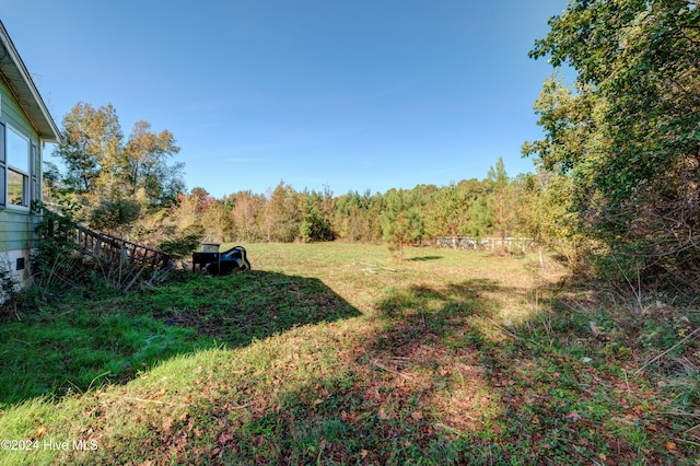 6609 Murrayville Rd, Wilmington, NC 28411 - view of green lawn with a forest view