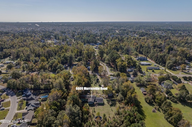 6609 Murrayville Rd, Wilmington, NC 28411 - aerial view of property and surrounding area featuring a heavily wooded area