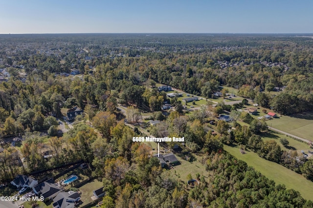 6609 Murrayville Rd, Wilmington, NC 28411 - aerial view of property and surrounding area with a heavily wooded area