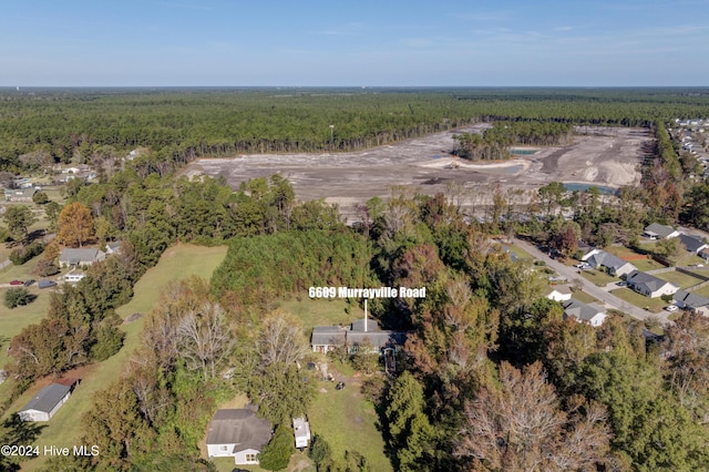 6609 Murrayville Rd, Wilmington, NC 28411 - aerial view of property and surrounding area featuring a heavily wooded area