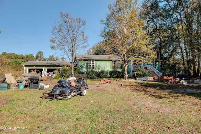 6609 Murrayville Rd, Wilmington, NC 28411 - back of property featuring a yard
