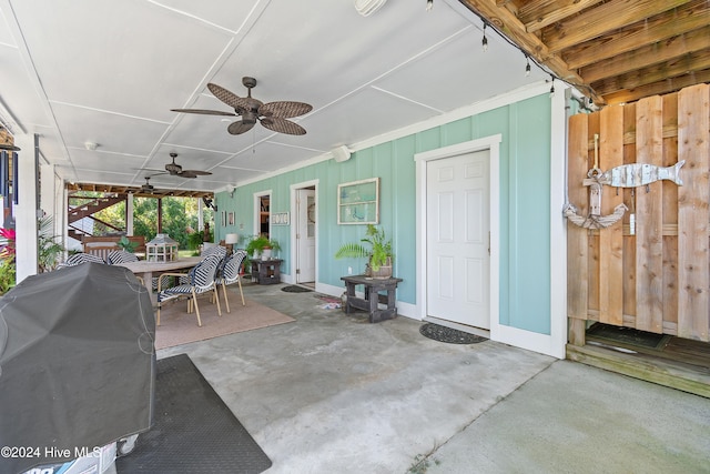 view of patio / terrace with area for grilling and ceiling fan