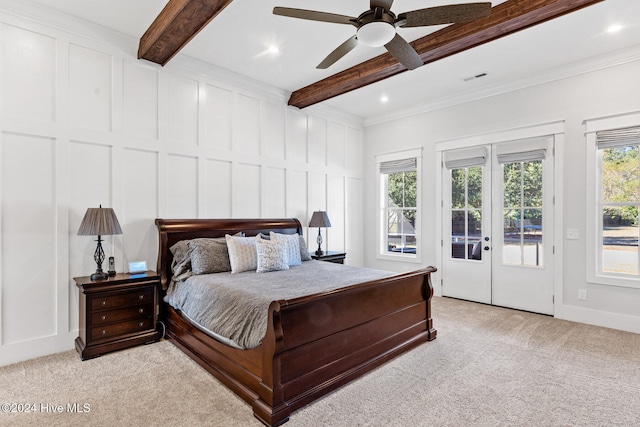 bedroom featuring access to exterior, ceiling fan, beamed ceiling, and light carpet