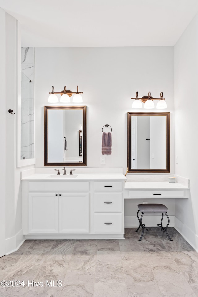 bathroom with vanity and walk in shower