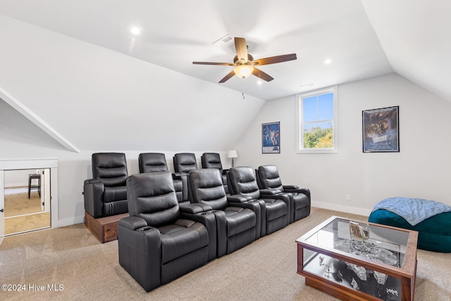 cinema featuring light colored carpet, ceiling fan, and lofted ceiling