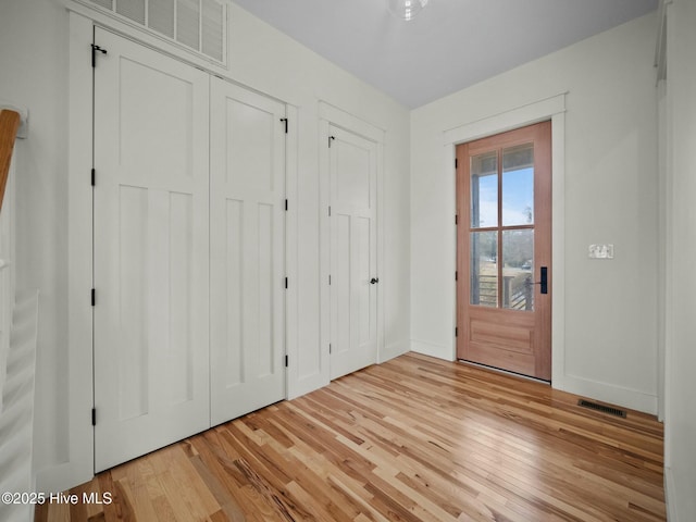 foyer featuring light wood-type flooring