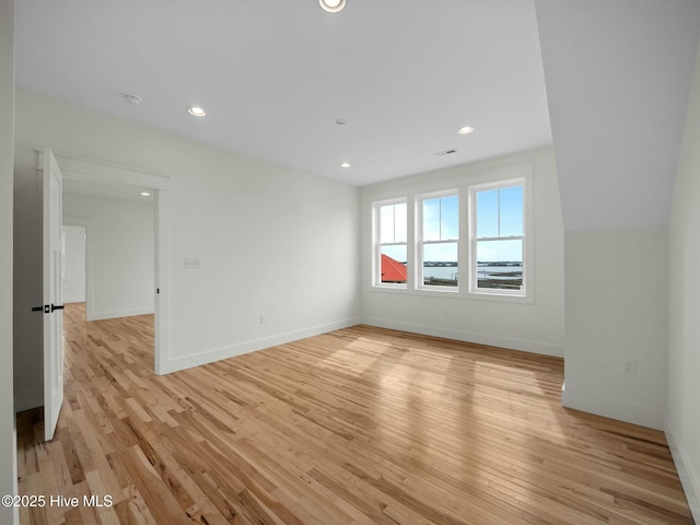 unfurnished room featuring light wood-type flooring