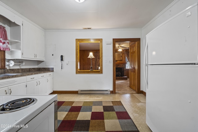 kitchen with ornamental molding, ceiling fan, white refrigerator, a baseboard radiator, and white cabinetry