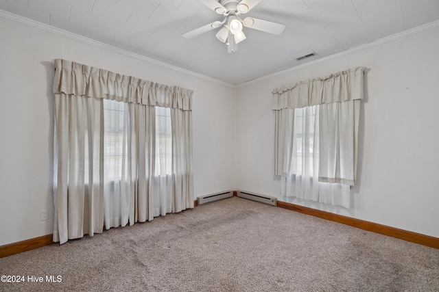 empty room featuring ceiling fan, carpet, crown molding, and plenty of natural light