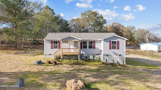 view of front of home with a front lawn and covered porch