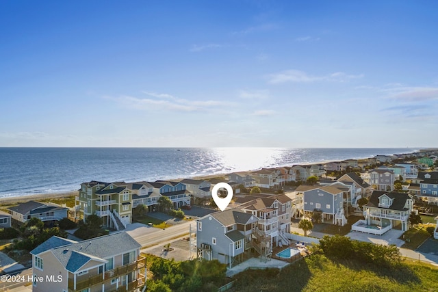 aerial view with a beach view and a water view