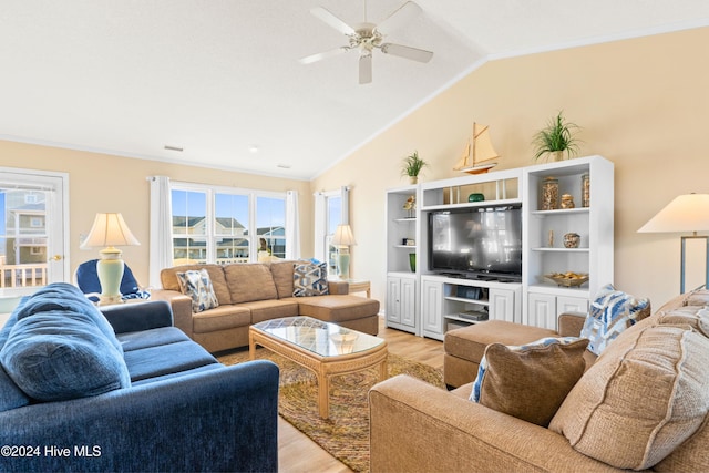 living room featuring vaulted ceiling, ceiling fan, visible vents, and light wood-style floors