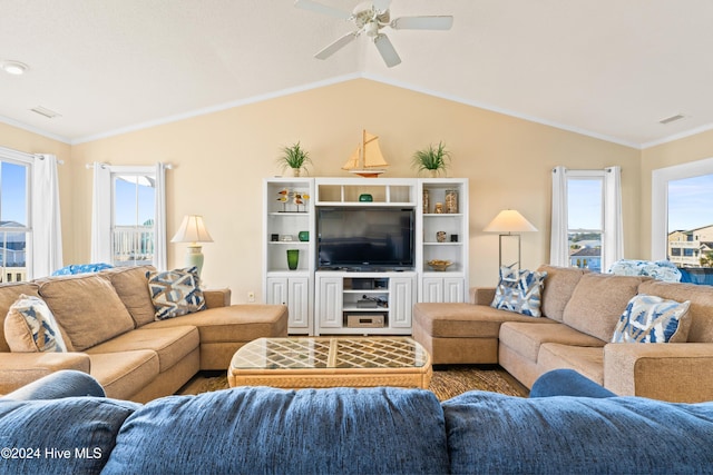 living room with lofted ceiling, ornamental molding, and visible vents