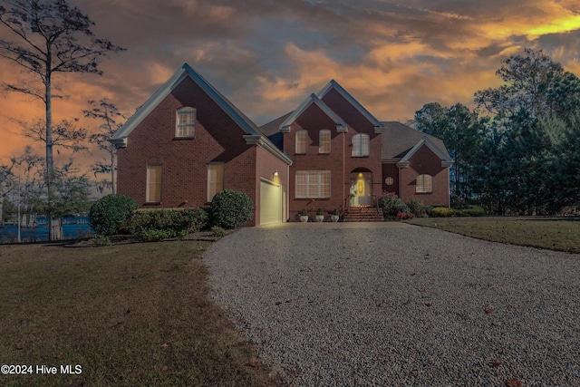 front of property featuring a lawn