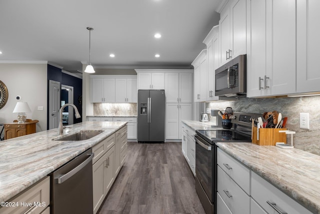 kitchen with white cabinets, stainless steel appliances, dark wood-type flooring, and sink