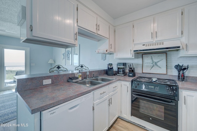 kitchen featuring white cabinetry, kitchen peninsula, white dishwasher, and black range with electric stovetop