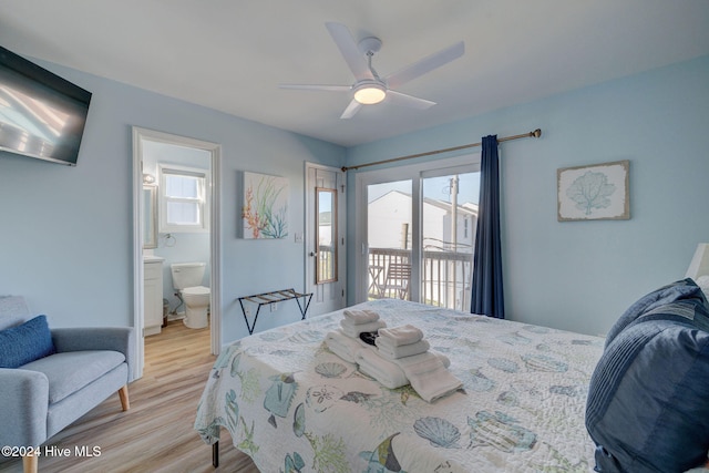 bedroom featuring connected bathroom, light wood-type flooring, ceiling fan, and access to exterior