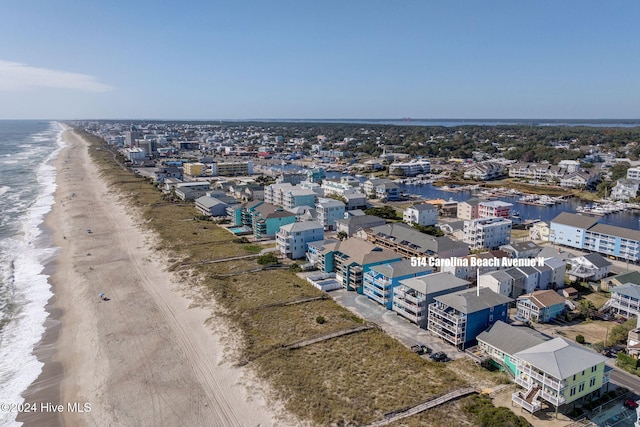 aerial view with a beach view and a water view