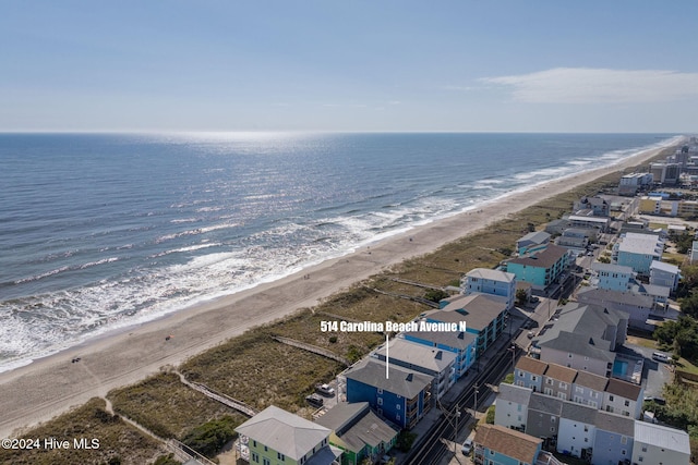 bird's eye view with a view of the beach and a water view