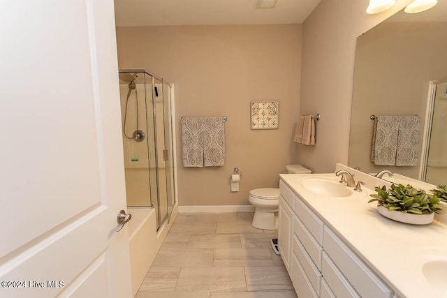 full bathroom featuring toilet, vanity, and separate shower and tub