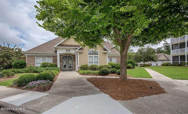 view of front of property with a front lawn