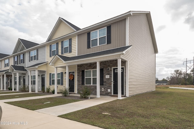 view of front of home with a front yard