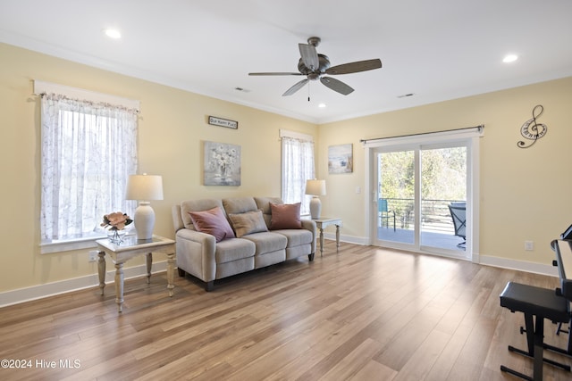 304 Birmingham Ave Unit 2, Carolina Beach, NC 28428 - living area featuring ceiling fan, light wood finished floors, baseboards, crown molding, and recessed lighting