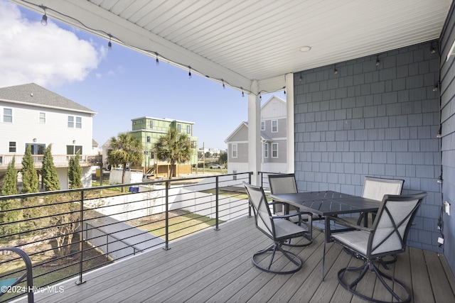 304 Birmingham Ave Unit 2, Carolina Beach, NC 28428 - wooden terrace with outdoor dining space