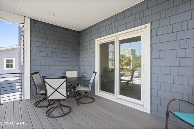 304 Birmingham Ave Unit 2, Carolina Beach, NC 28428 - deck featuring outdoor dining area