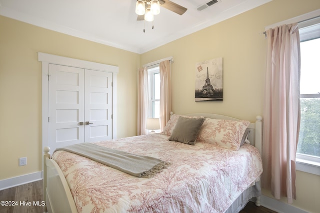 304 Birmingham Ave Unit 2, Carolina Beach, NC 28428 - bedroom featuring dark wood finished floors, baseboards, a closet, and a ceiling fan