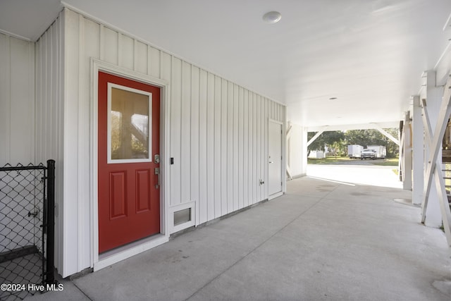304 Birmingham Ave Unit 2, Carolina Beach, NC 28428 - view of exterior entry featuring board and batten siding