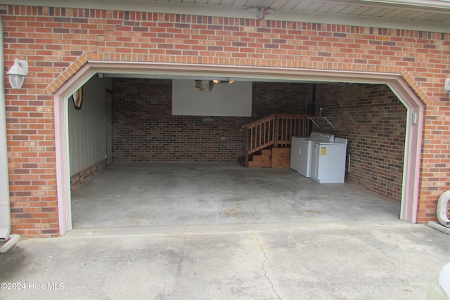 garage featuring washer and dryer