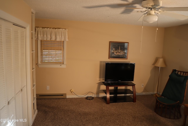 unfurnished living room featuring a textured ceiling, carpet floors, a baseboard radiator, and ceiling fan